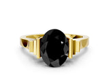 Yellow gold Fancy Black Oval Cut Brilliant Solitaire Diamond Ring with Channel Set Band and Bar Prong Setting