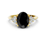 Yellow gold Fancy Black Oval Cut Cut Diamond Cluster Ring with Solitaire Band and Four-Prong Setting
