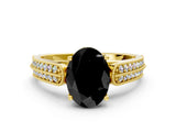 Yellow gold Fancy Black Oval Cut Cut Pave Split Shank Engagement Ring with Four-Prong Setting