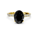 Yellow gold Fancy Black Oval Cut Diamond Solitaire Engagement Ring with Pavé Band and Prong Setting