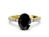 Yellow gold Fancy Black Oval Cut Diamond Solitaire Pavé Band with Four-Prong Setting