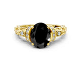 Yellow gold Fancy Black Oval Cut Diamond Solitaire Ring with Filigree Band and Four-Prong Setting