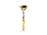 Yellow gold Fancy Black Oval Cut Diamond Solitaire with Side Baguettes and Channel Set Band_2