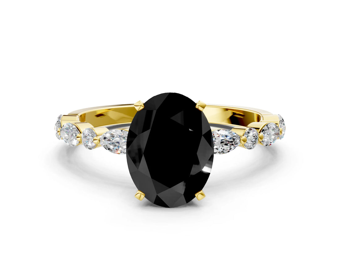 Yellow gold Fancy Black Oval Cut Diamond Solitaire with Side Stones on a Pavé Band and Four-Prong Setting