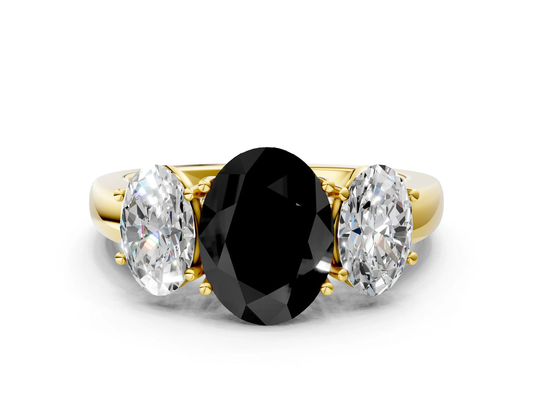 Yellow gold Fancy Black Oval Cut Diamond Three-Stone Ring with Four-Prong Setting and Classic Band