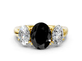 Yellow gold Fancy Black Oval Cut Diamond Three-Stone Ring with Four-Prong Setting and Classic Band