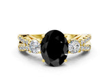 Yellow gold Fancy Black Oval Cut Diamond Three-Stone Ring with Pavé Split Shank and Four-Prong Setting