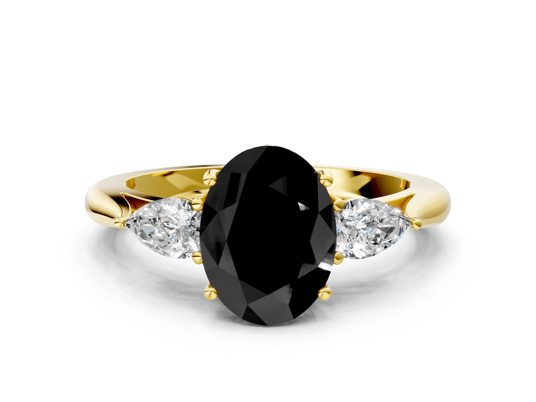 Yellow gold Fancy Black Oval Cut Diamond Three-Stone Ring with Pear Side Stones and Four-Prong Setting_48