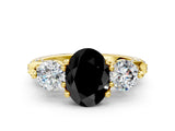Yellow gold Fancy Black Oval Cut Diamond Three-Stone Ring with Prong Setting and Pavé Band