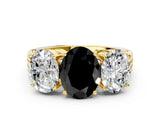Yellow gold Fancy Black Oval Cut Diamond Three-Stone Ring with Prong Setting and Textured Band