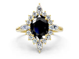 Yellow gold Fancy Black Oval Cut Halo Diamond Cluster Ring with Marquise and Round Stones on a White Gold Band with Prong Setting