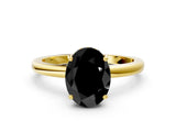 Yellow gold Fancy Black Oval Cut Solitaire Diamond Ring with Prong Setting and Plain Band