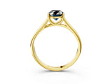 Yellow gold Fancy Black Oval Cut Solitaire Engagement Ring with Tapered Band and Four-Prong Setting_6