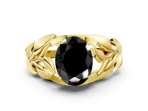 Yellow gold Fancy Black Oval Cut Solitaire Leaf-Inspired Engagement Ring with Prong Setting