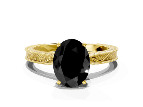 Yellow gold Fancy Black Oval Cut Solitaire Milgrain Engraved Band with Four-Prong Setting