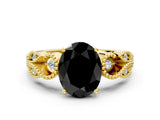 Yellow gold Fancy Black Oval Cut Solitaire Milgrain Leaf Band with Prong Setting