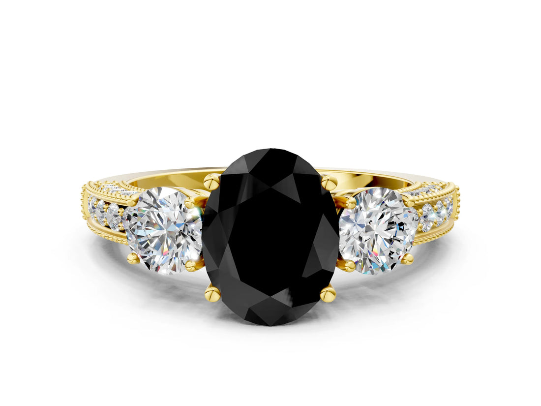 Yellow gold Fancy Black Oval Cut Three-Stone Diamond Ring with Pavé Band and Four-Prong Setting
