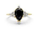 Yellow gold Fancy Black Pear Cut Brilliant Diamond with Cluster Setting on a Beaded Band and Four-Prong Setting