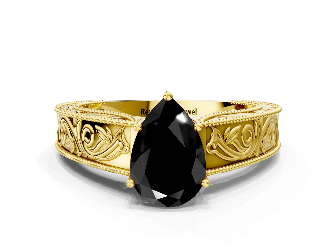 Yellow gold Fancy Black Pear Cut Cut Solitaire Engraved Band with Four-Prong Setting