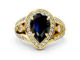 Yellow gold Fancy Black Pear Cut Diamond Halo Ring with Split Shank and Bezel Accents and Four-Prong Setting