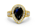 Yellow gold Fancy Black Pear Cut Diamond Halo Ring with Split Shank and Bezel Accents and Prong Setting