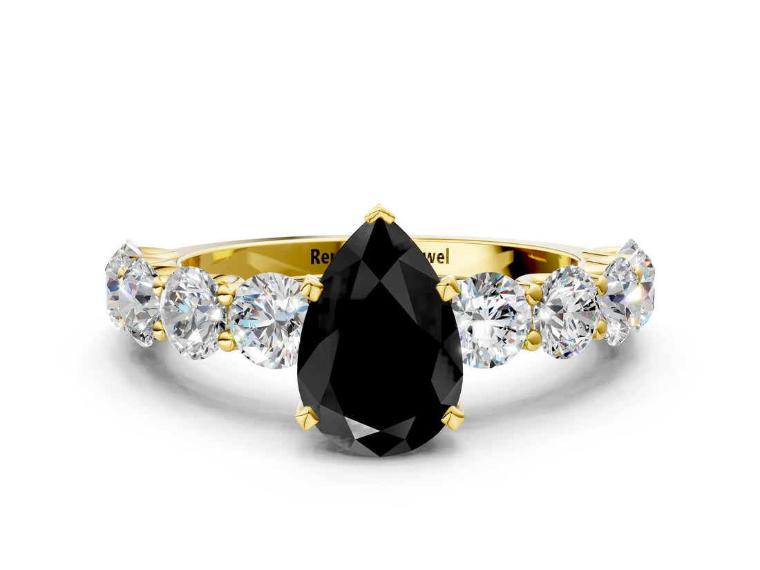 Yellow gold Fancy Black Pear Cut Diamond Prong Setting with Side Stones on a Pave Band