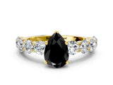 Yellow gold Fancy Black Pear Cut Diamond Prong Setting with Side Stones on a Pave Band