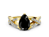 Yellow gold Fancy Black Pear Cut Diamond Solitaire Ring with Four-Prong Setting and Twisted Pavé Band