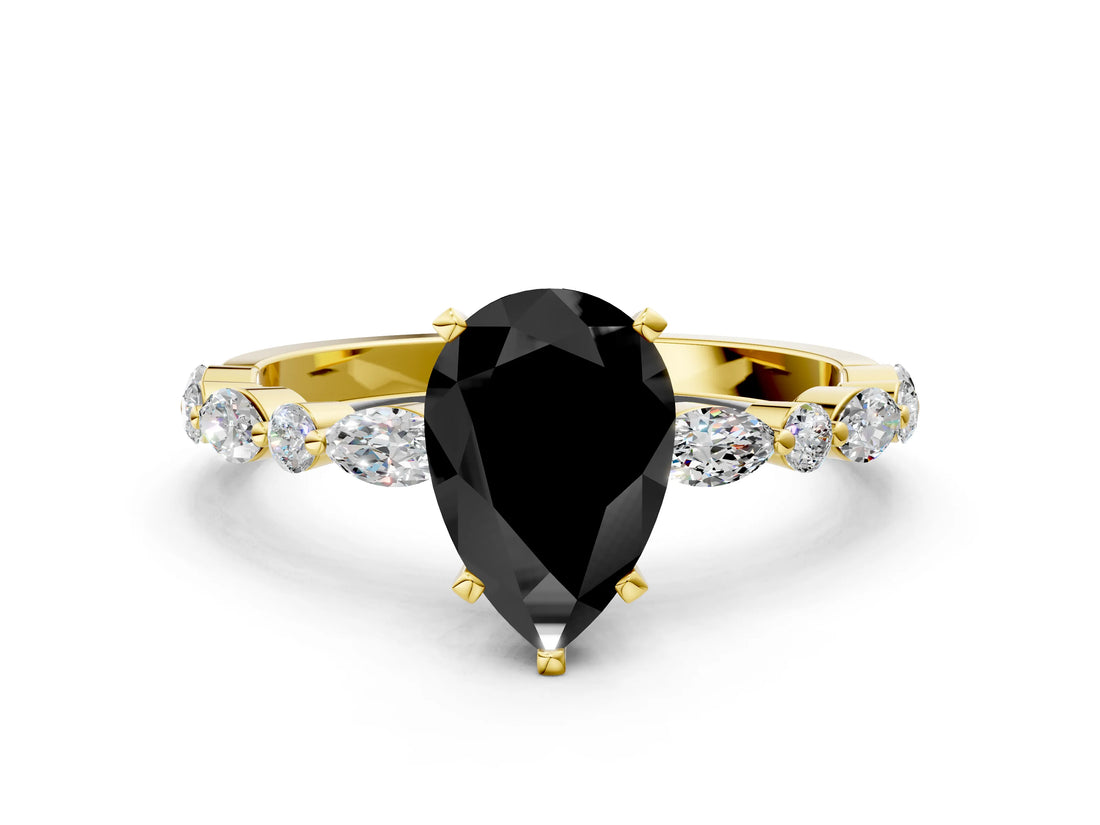 Yellow gold Fancy Black Pear Cut Diamond Solitaire with Side Stones on a Pavé Band and Four-Prong Setting