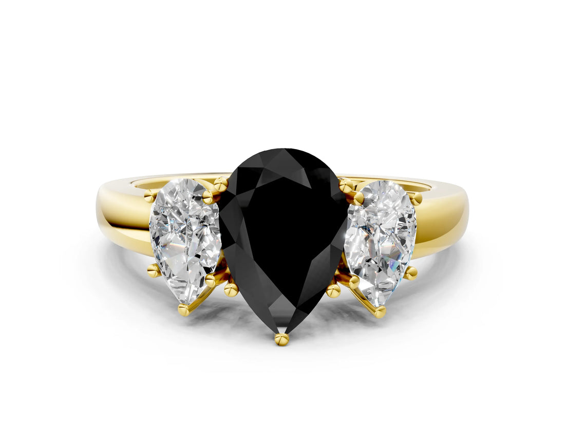 Yellow gold Fancy Black Pear Cut Diamond Three-Stone Ring with Four-Prong Setting and Classic Band
