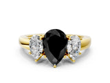 Yellow gold Fancy Black Pear Cut Diamond Three-Stone Ring with Four-Prong Setting and Classic Band