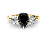 Yellow gold Fancy Black Pear Cut Diamond Three-Stone Ring with Prong Setting and Pavé Band