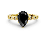Yellow gold Fancy Black Pear Cut Solitaire Diamond Ring with Infinity Twist Band and Four-Prong Setting