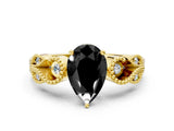 Yellow gold Fancy Black Pear Cut Solitaire Milgrain Leaf Band with Prong Setting