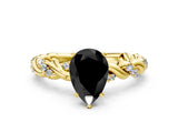 Yellow gold Fancy Black Pear Cut Solitaire Twisted Band with Pavé Accents and Four-Prong Setting