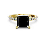 Yellow gold Fancy Black Princess Cut Diamond Brilliant Solitaire Ring with Pavé Band and Four-Prong Setting