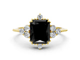 Yellow gold Fancy Black Radiant Cut Brilliant Diamond with Cluster Setting on a Beaded Band and Four-Prong Setting