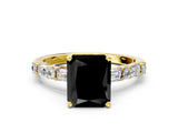 Yellow gold Fancy Black Radiant Cut Diamond Solitaire with Side Baguettes and Channel Set Band