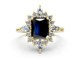 Yellow gold Fancy Black Radiant Cut Halo Diamond Cluster Ring with Marquise and Round Stones on a White Gold Band with Prong Setting