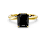 Yellow gold Fancy Black Radiant Cut Solitaire Engagement Ring with Cathedral Band and Four-Prong Setting