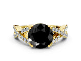 Yellow gold Fancy Black Round Cut Diamond Solitaire Ring with Four-Prong Setting and Twisted Pavé Band