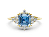 Yellow gold Fancy Blue Asscher Cut Brilliant Diamond with Cluster Setting on a Beaded Band and Four-Prong Setting