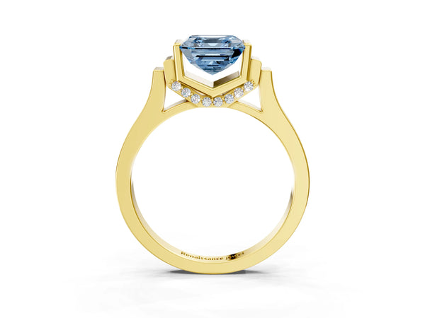 Yellow gold Fancy Blue Asscher Cut Brilliant Solitaire Diamond Ring with Channel Set Band and Bar Prong Setting