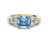 Yellow gold Fancy Blue Asscher  Cut Diamond Cluster Ring with Round Accent Stones and Prong Setting on a Classic Band_45