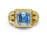 Yellow gold Fancy Blue Asscher Cut Diamond Halo Ring with Split Shank and Bezel Accents and Four-Prong Setting