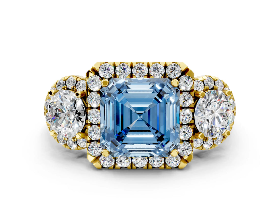 Yellow gold Fancy Blue Asscher Cut Diamond Three-Stone Halo Ring with Prong Setting and Pavé Accents