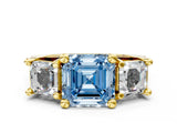 Yellow gold Fancy Blue Asscher Cut Diamond Three-Stone Ring with Channel Set Band and Four-Prong Setting_56