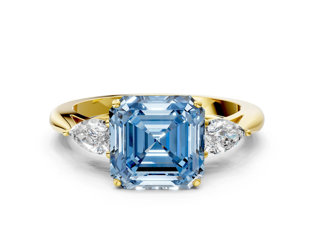 Yellow gold Fancy Blue Asscher Cut Diamond Three-Stone Ring with Pear Side Stones and Four-Prong Setting_86