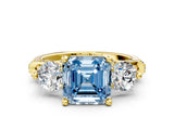Yellow gold Fancy Blue Asscher Cut Diamond Three-Stone Ring with Prong Setting and Pavé Band