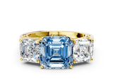 Yellow gold Fancy Blue Asscher Cut Diamond Three-Stone Ring with Prong Setting and Textured Band